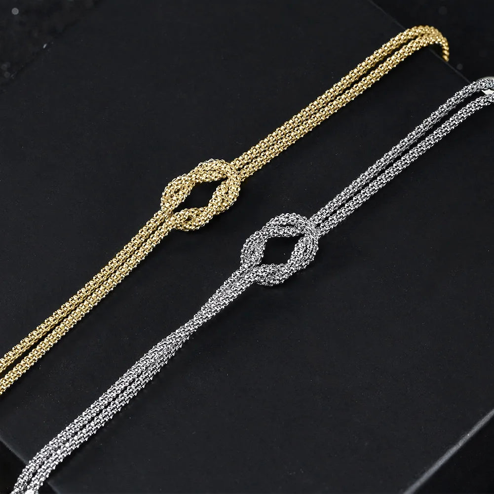 925S SILVER 14K GOLD 1,5MM "KNOT" ARMBAND