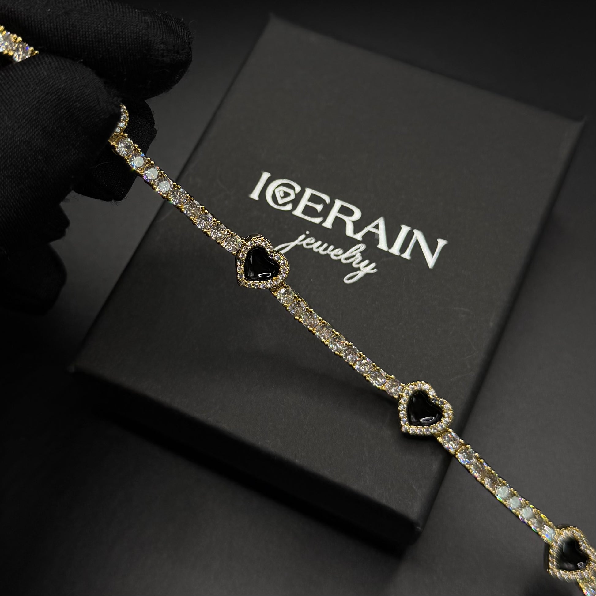 SALE | ICED OUT "GOLD/BLACK HEART CLOVER TENNIS" ARMBAND - ICERAIN JEWELRY
