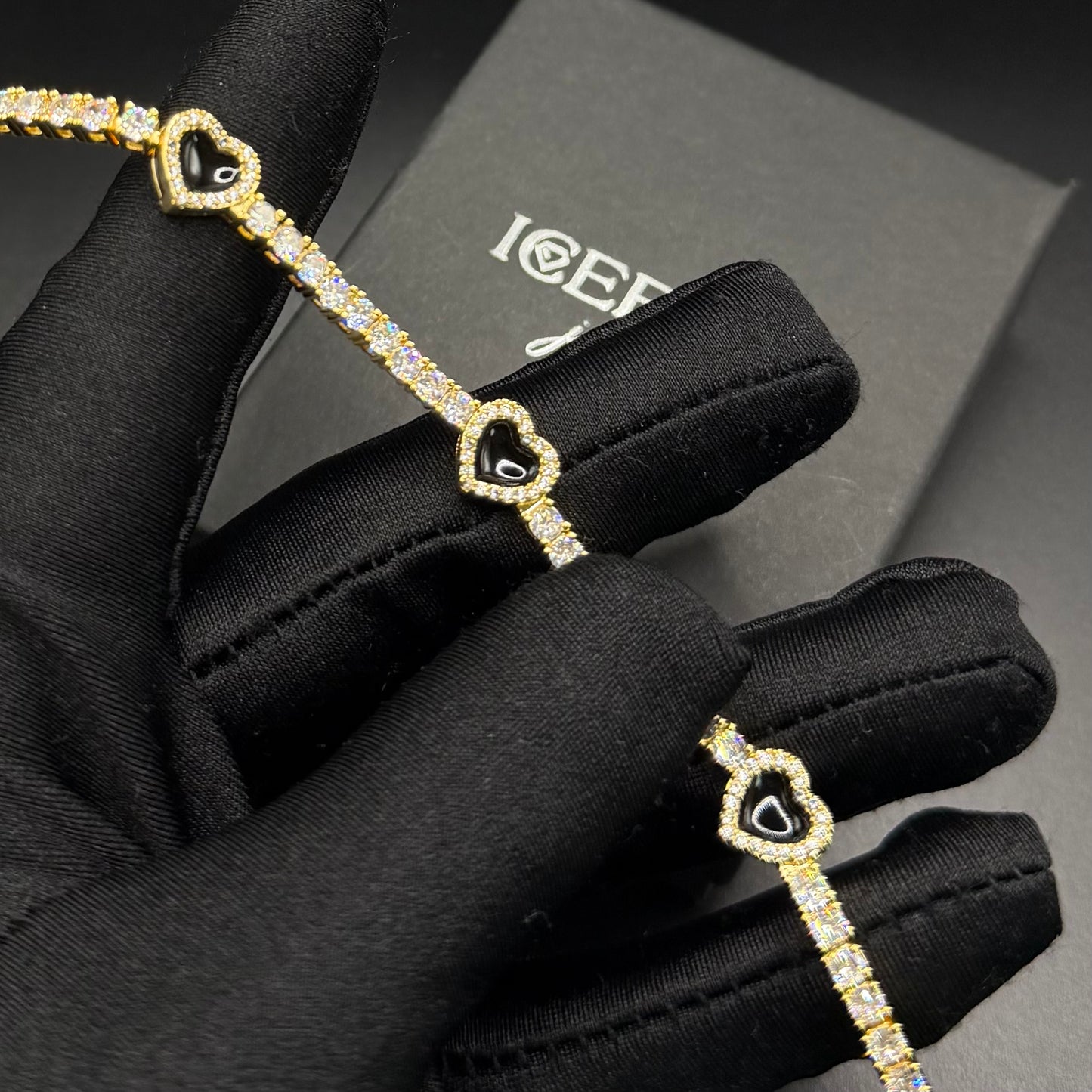 SALE | ICED OUT "GOLD/BLACK HEART CLOVER TENNIS" ARMBAND - ICERAIN JEWELRY